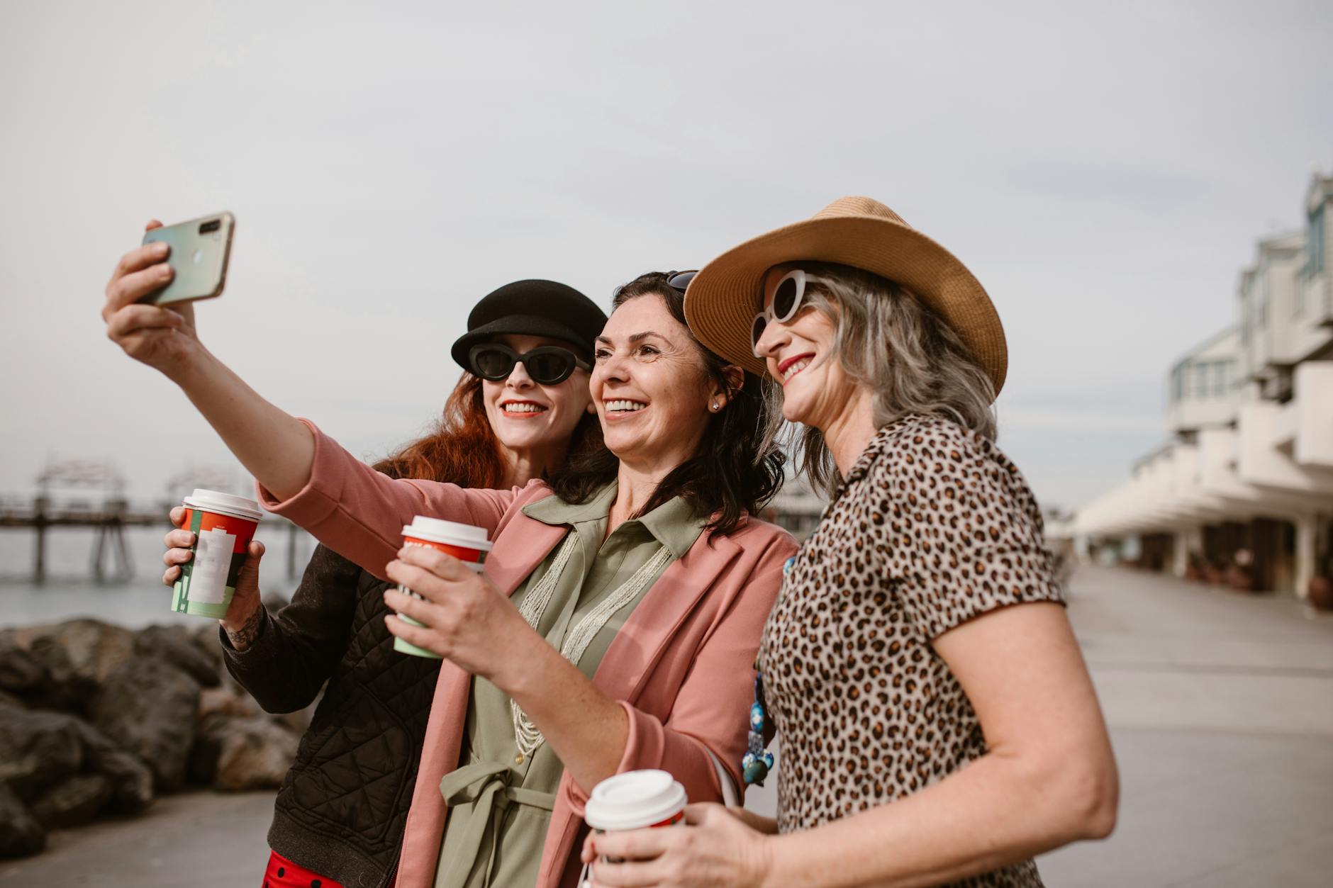 three women taking selfie